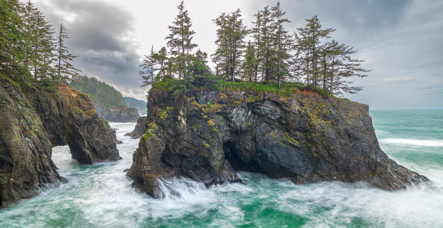 A panorama of the Natural Bridges sea arches near Brookings, Samuel H. Boardman corridor.