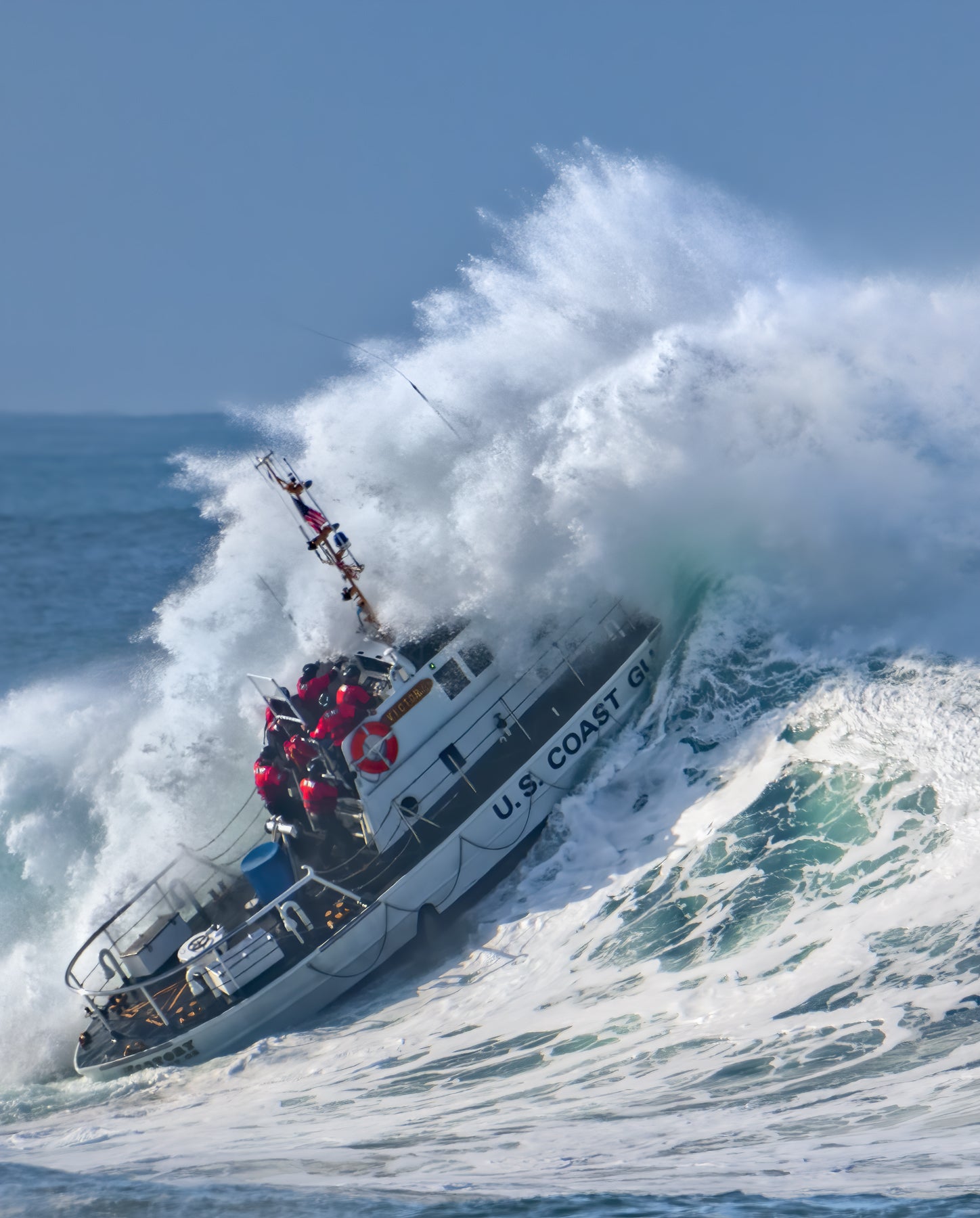 A Coast Guard motor lifeboat training in heavy surf off the Oregon Coast.